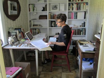 Beth Follett working at her desk