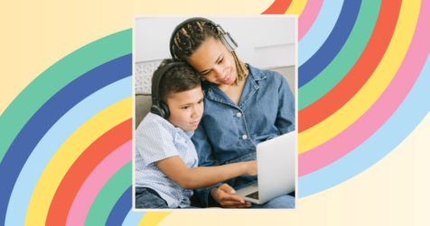 Image of a parent and child looking at a computer screen together on a pastel rainbow background