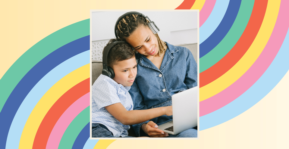 Image of a parent and child looking at a computer screen together on a pastel rainbow background