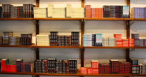 Photo of shelves in the MOTIVE bookstore stacked with books.